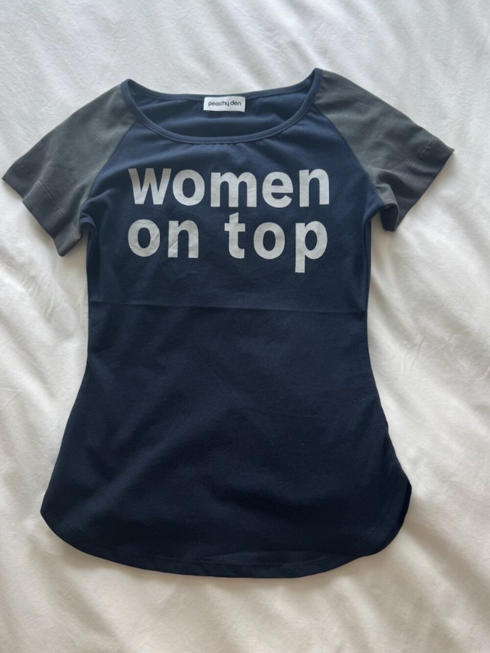 Peachy den navy blue and grey "woman on top" t shirt